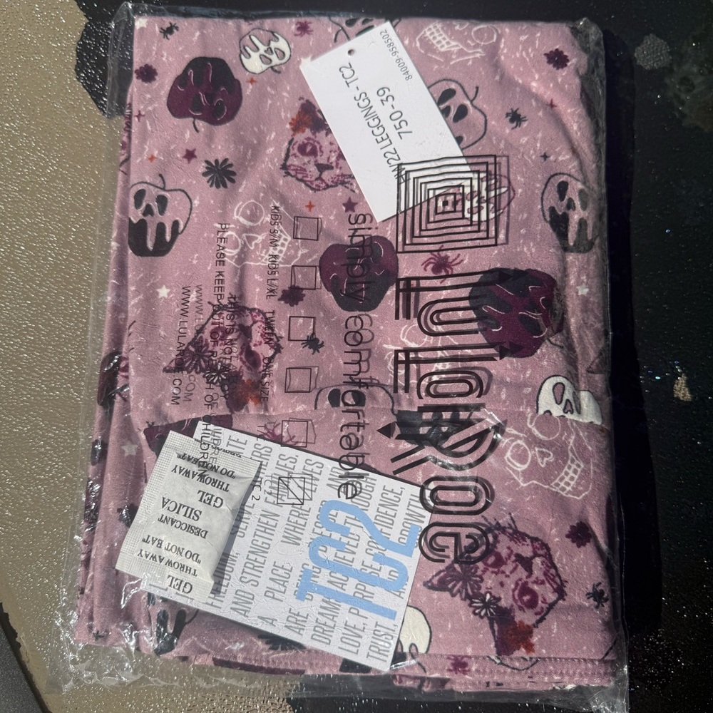 LuLaRoe Purple and White Skull Pattern Leggings